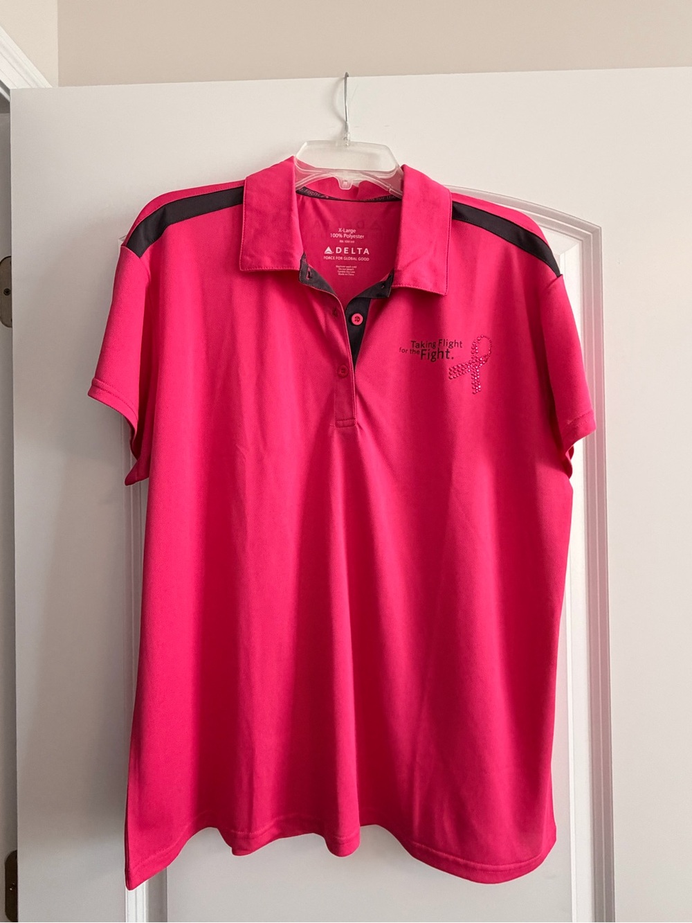 Delta Hot Pink Polo with Black Shoulder Stripes
